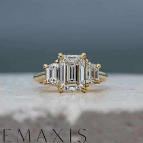 Yellow Gold Emerald Cut Diamond and Trapezoid Trilogy Engagement Ring